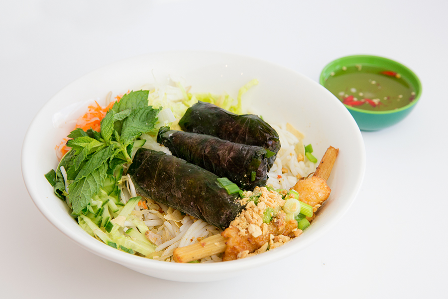Vermicelli with grilled spicy beef wrapped in herb leaves